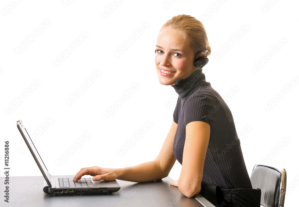 Businesswoman or secretary with headset and laptop Businesswoman or secretary with headset and laptop