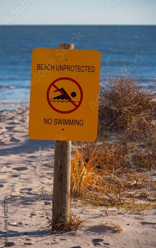 No swimming, unprotected beach