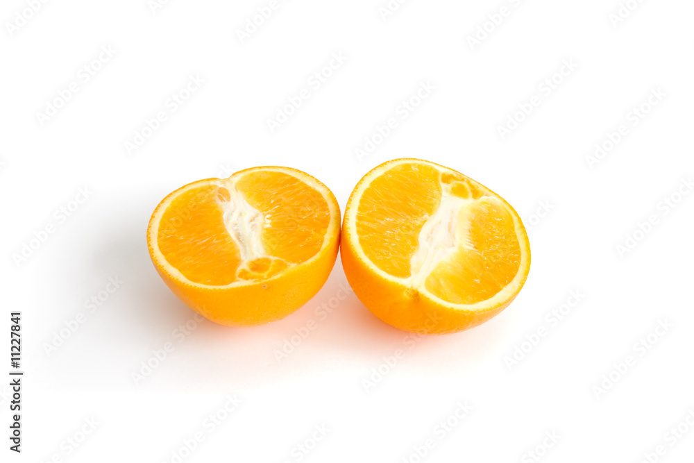 Photo of two halfs of orange isolated on white background Photo of two halfs of orange isolated on white background