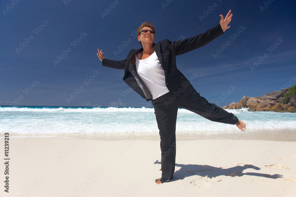 businesswoman happy to be on the beach businesswoman happy to be on the beach
