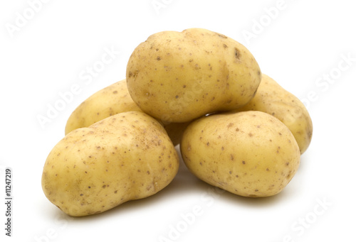 raw potatoes on white background