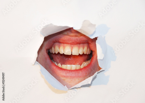 womans mouth through paper photo