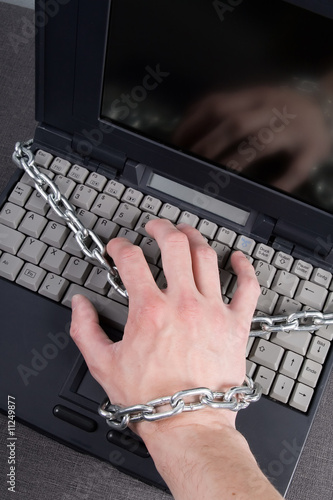 Laptop and a hand