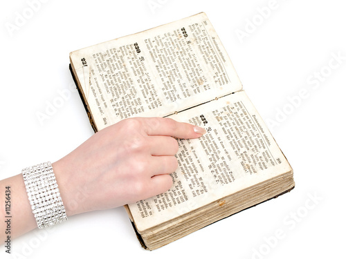 woman reading old book