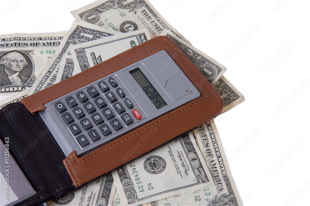 american money with notepad and calculator american money with notepad and calculator