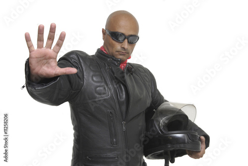 Motorbike rider with a stop gesture
