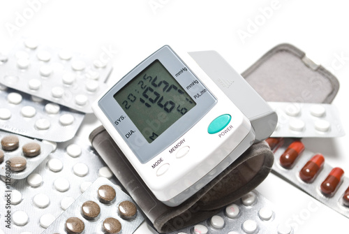 Blood pressure monitor and pills