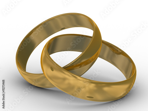 Two gold wedding rings. the...