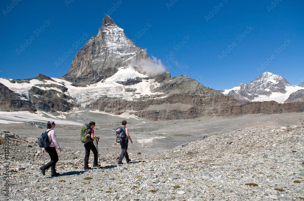 group of hikers heading towards Matterhorn