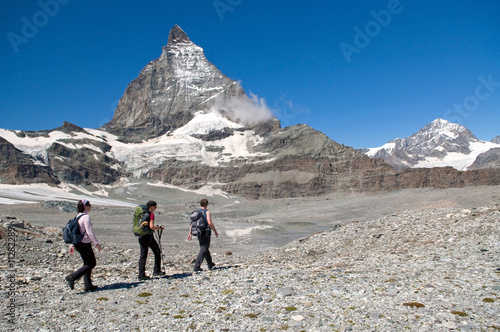 group of hikers heading towards Matterhorn