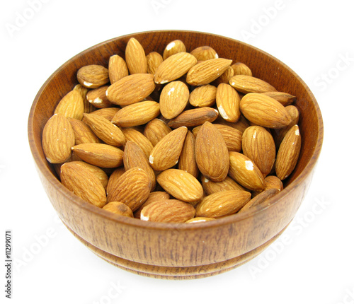 Almonds in wooden dish photo