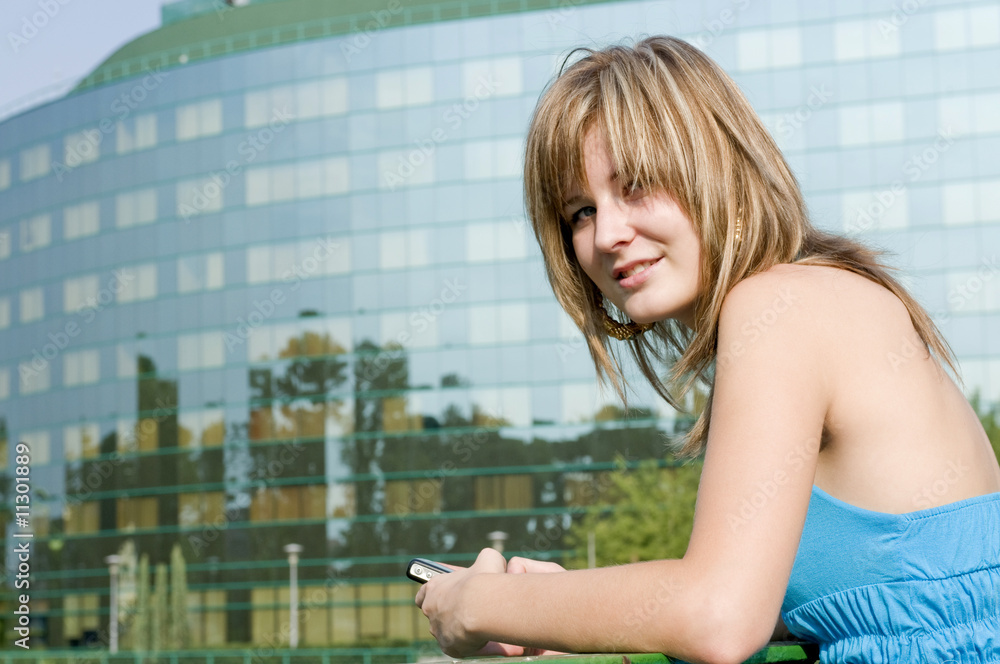 Fototapeta premium Girl with a mobile phone