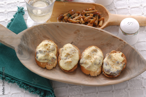 Crostini di formaggio e chiodini - Antipasto - Trentino A.A. photo