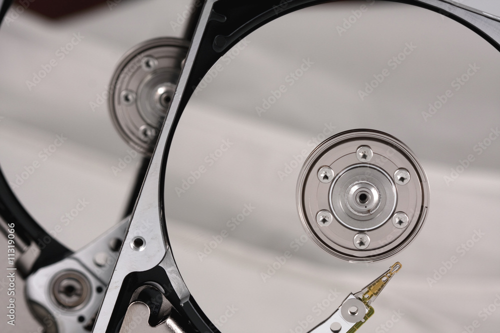 Computer hard drive needle and platter in the case Computer hard drive needle and platter in the case