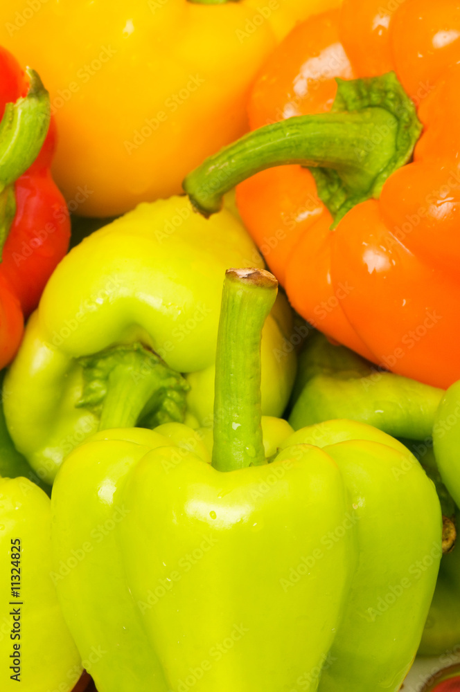 Bell peppers arranged at the market stand Bell peppers arranged at the market stand