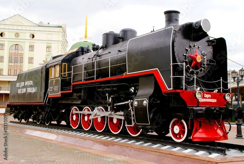 Steam locomotive standing like monument