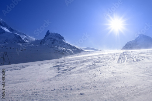 Sunny slope in Alps