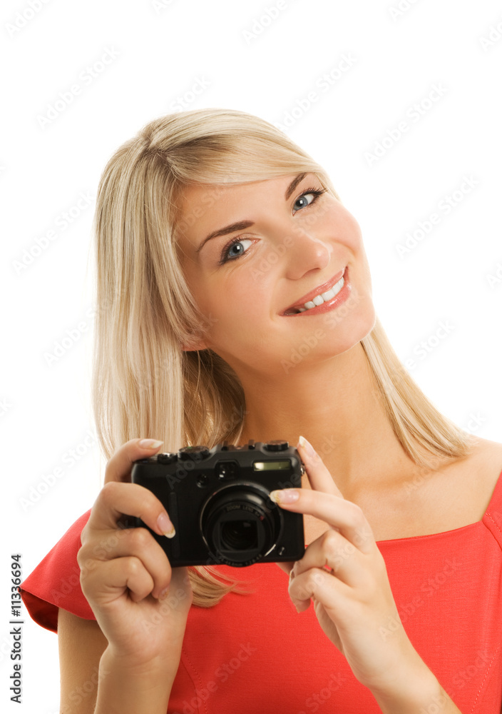Beautiful smiling woman with digital camera Beautiful smiling woman with digital camera