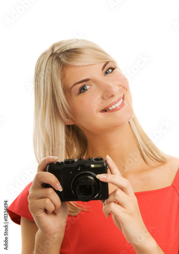 Beautiful smiling woman with digital camera © Nejron Photo