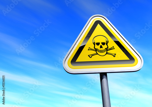 Danger skull sign against the blue sky