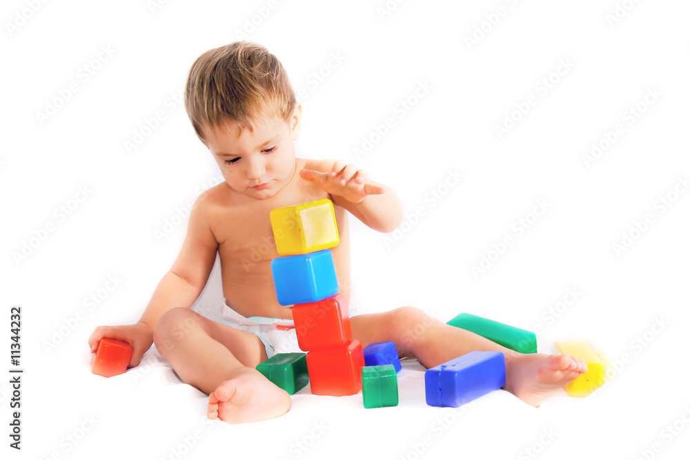 child playing with bulding blocks child playing with bulding blocks