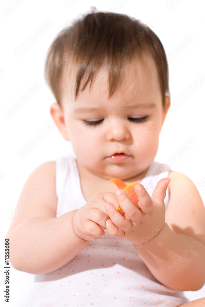 adorable baby girl holding tulip petals (focus on hands) adorable baby girl holding tulip petals (focus on hands)