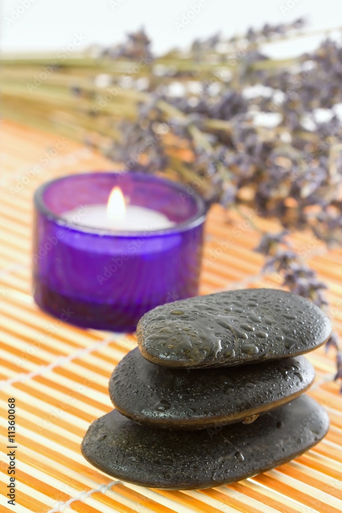 Obraz premium Pebbles, candle and lavender. Time to relax.
