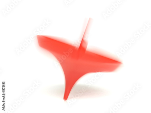 Spinning top with motion blur showing rotation