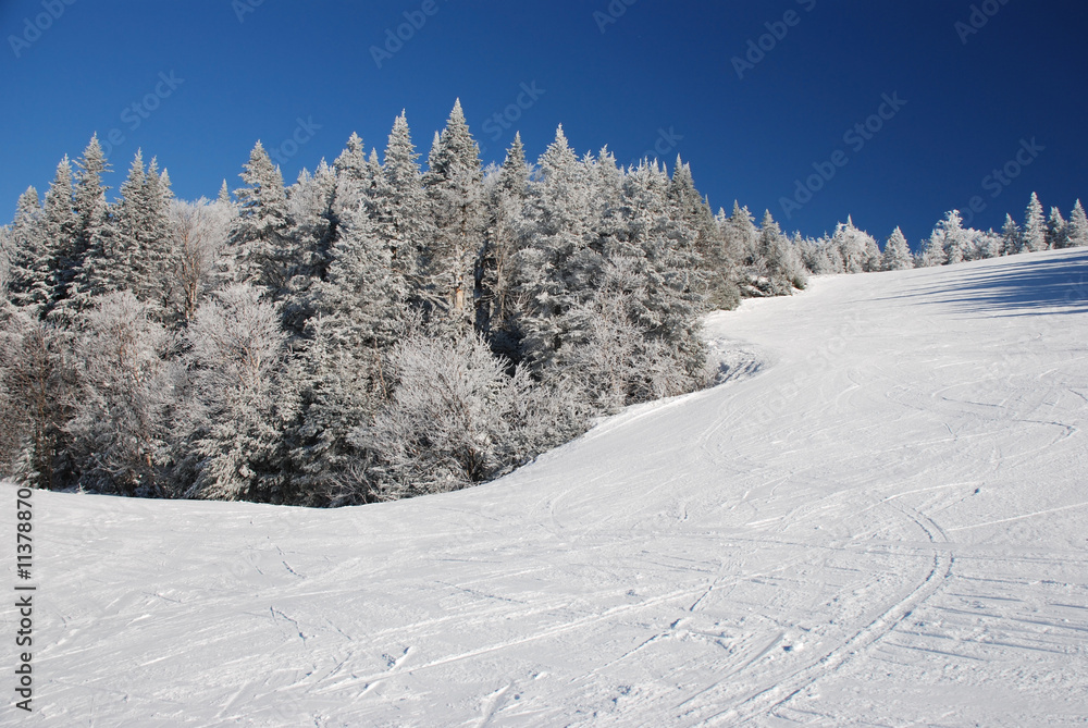 Winter hill with ski tracks