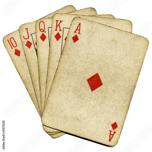 Royal flush old vintage poker cards isolated over white.