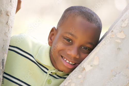 Young Boy and a Tree