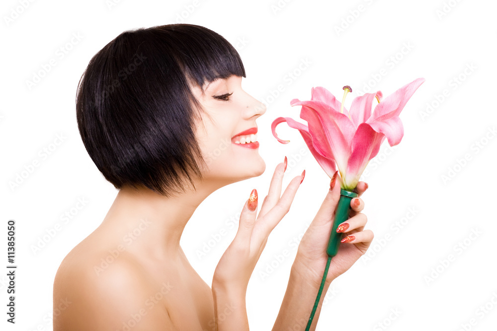 beautiful brunette girl holding a flower