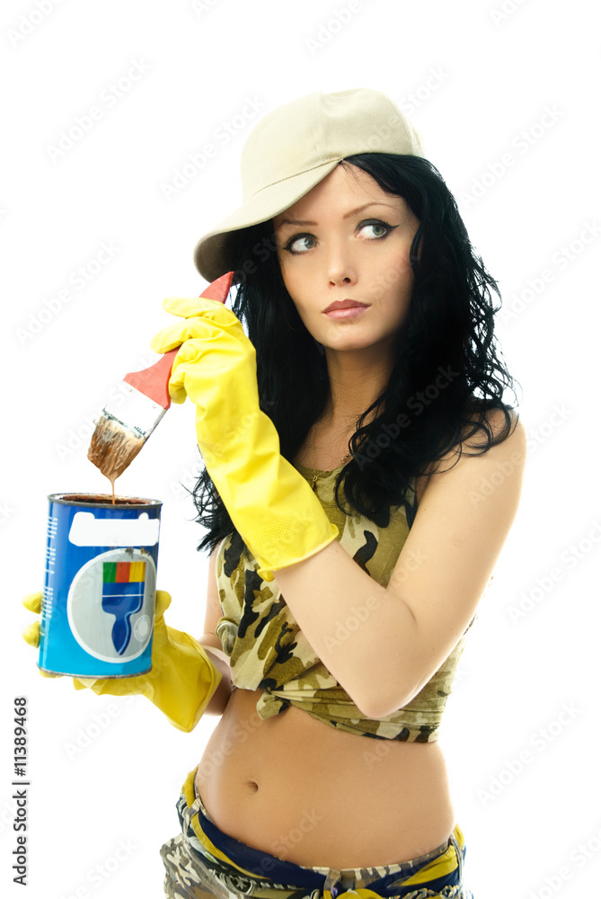 yougn woman paints the walls yougn woman paints the walls