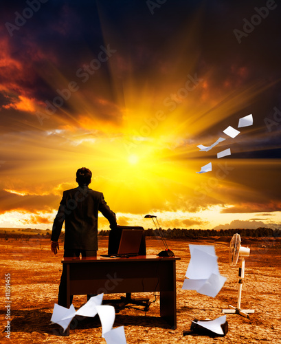 A businessman  with his paperwork. Recession. Crisis.