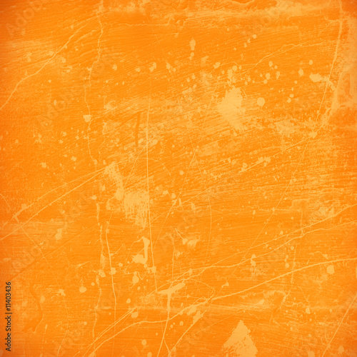 Stained orange plaster wall