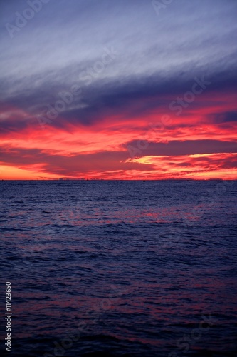 Red and blue sunrise in Mediterranean sea © lunamarina