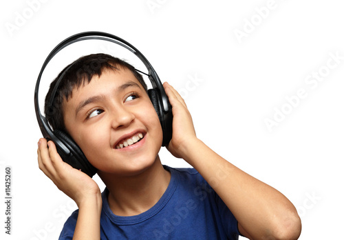 Фотография boy listening music in headphones