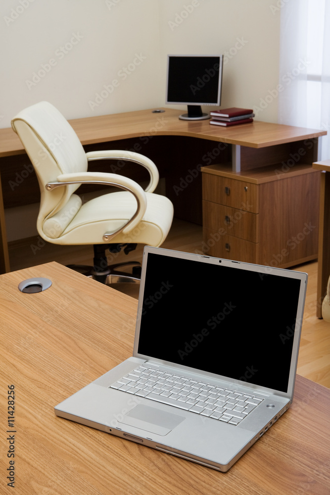 laptop on a table laptop on a table