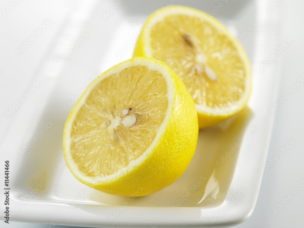 cut lemon on the white back ground cut lemon on the white back ground