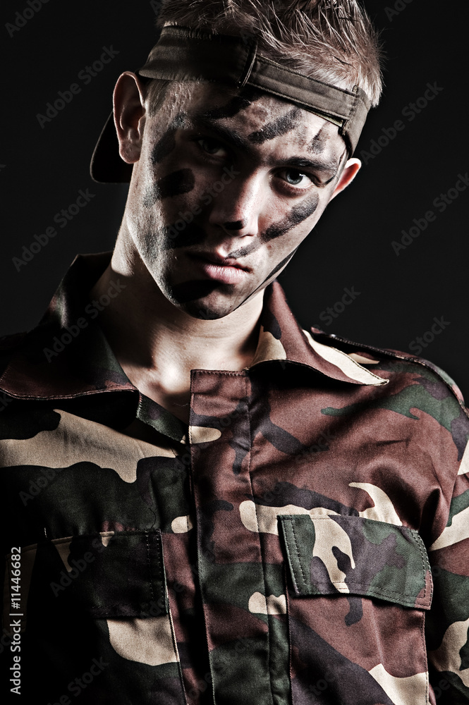 portrait of young serious soldier
