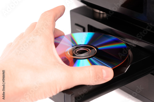 Obraz na plátně Inserting a disc