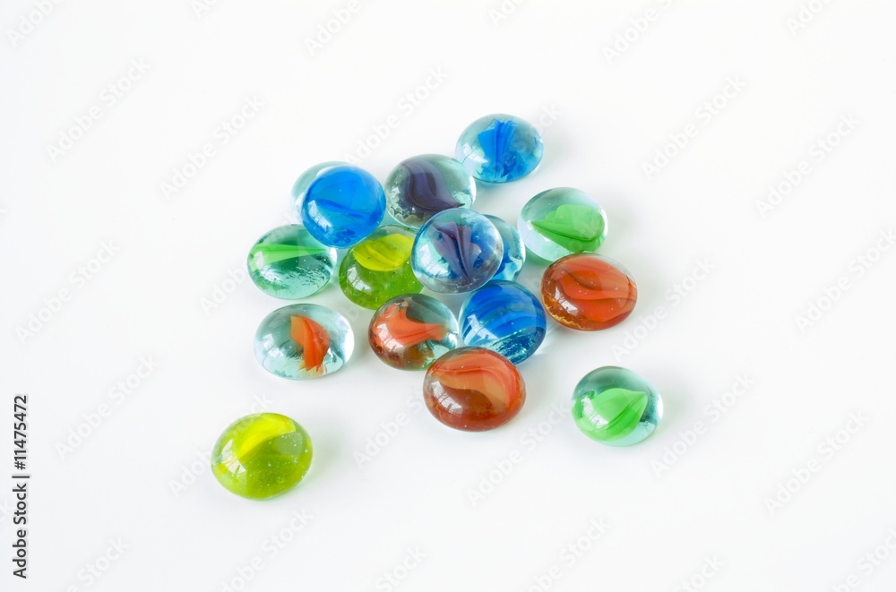 Flat Marbles used in board game. Stock Photo