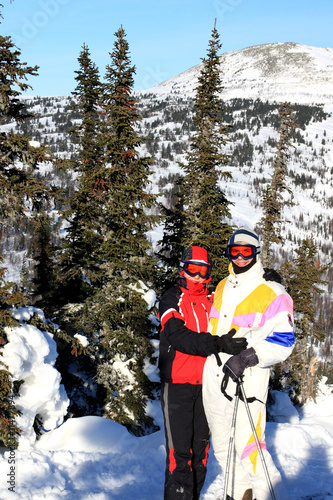 Family of mountain-skiers. photo