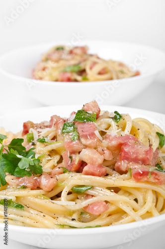 Two servings of traditional spaghetti carbonara