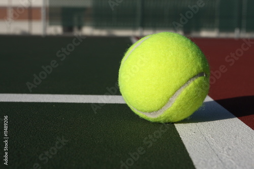Tennis ball on the court © 33ft