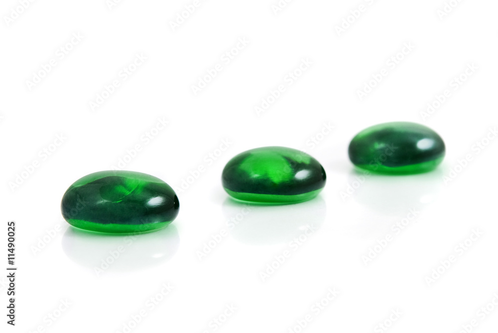 zen-like spa green shiny stones isolated on white zen-like spa green shiny stones isolated on white
