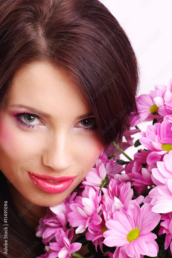 Attractive beauty woman face with flowers Attractive beauty woman face with flowers