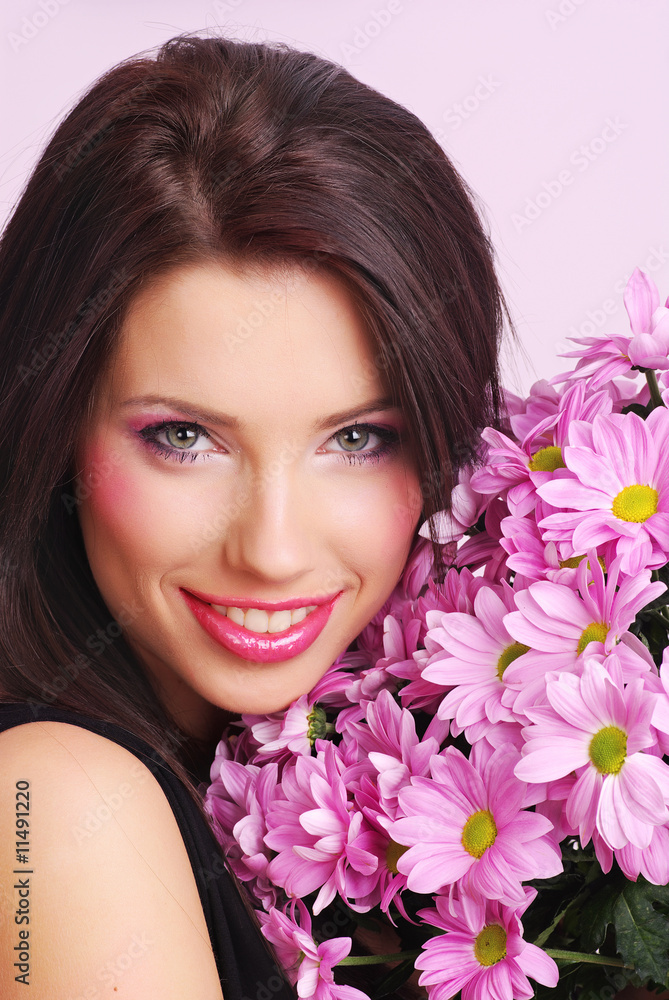 Attractive beauty woman face with flowers Attractive beauty woman face with flowers