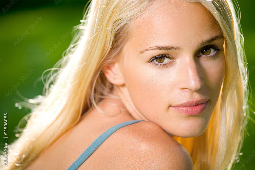 Portrait of young beautiful sexy smiling woman outdoors Portrait of young beautiful sexy smiling woman outdoors