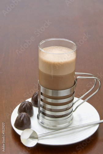 Hot chocolate in a contemporary stainless steel glass photo